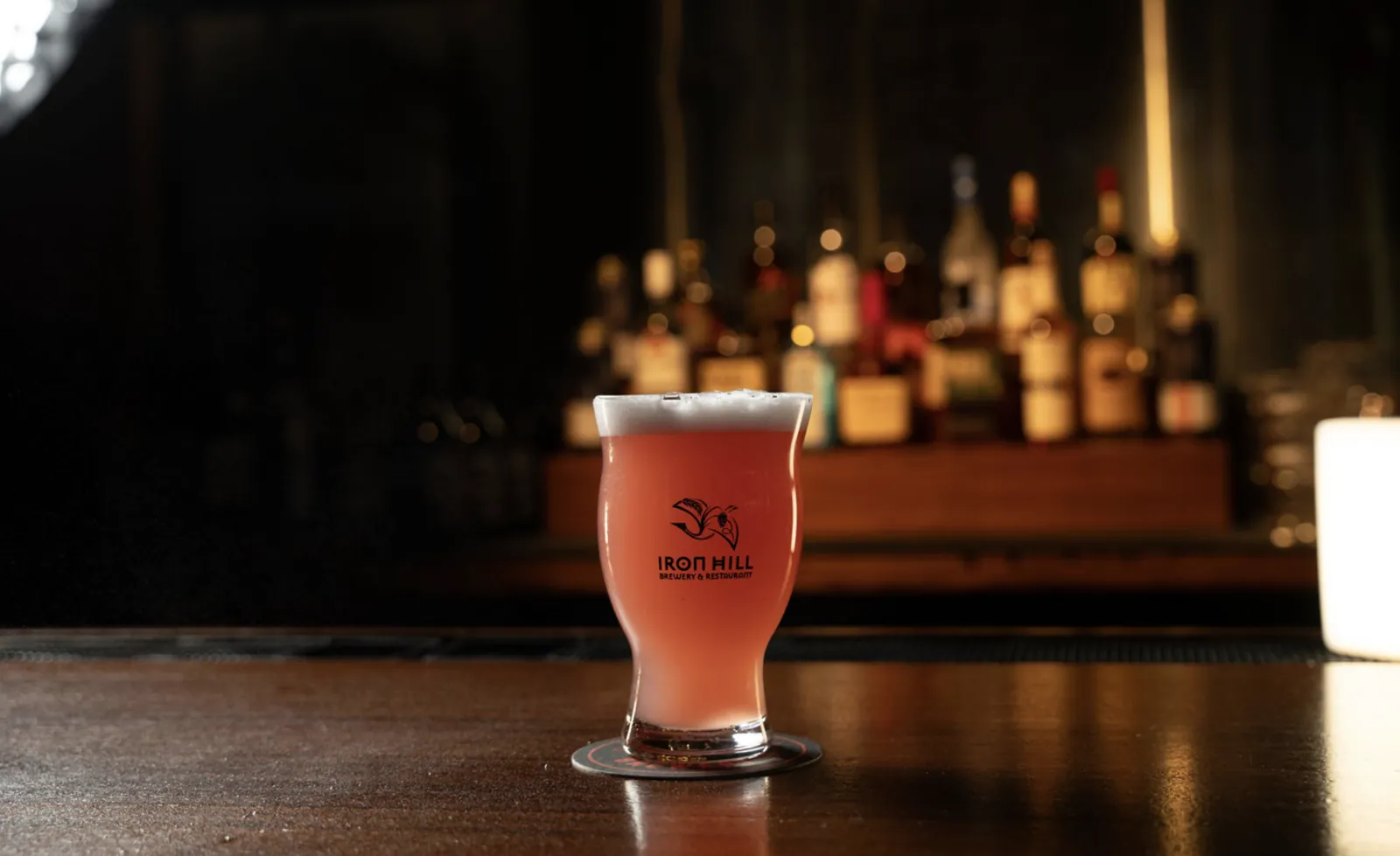 A fresh 22oz pour of Iron Hill craft beer